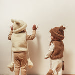 BINIBAMBA Merino wool baby gloves in natural Milk colour