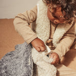 sheepskin hot water bottles by binibamba in grey and milk
