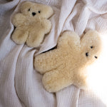 sheepskin teddy bear in milk colours, the perfect newborn gift for any baby