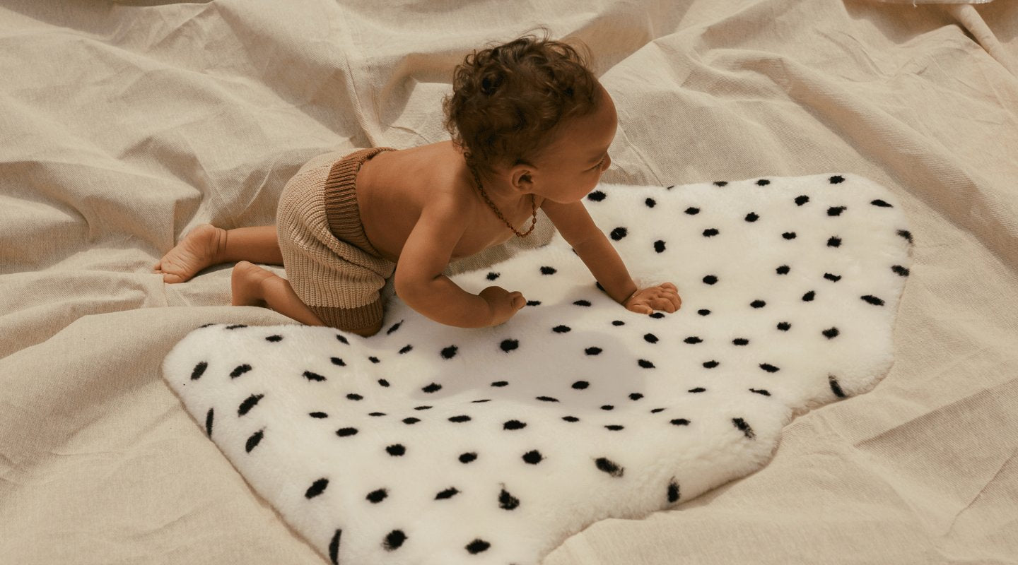 Luxury sheepskin rugs suitable for babies...meet the BINIBAMBA Wrigglemat