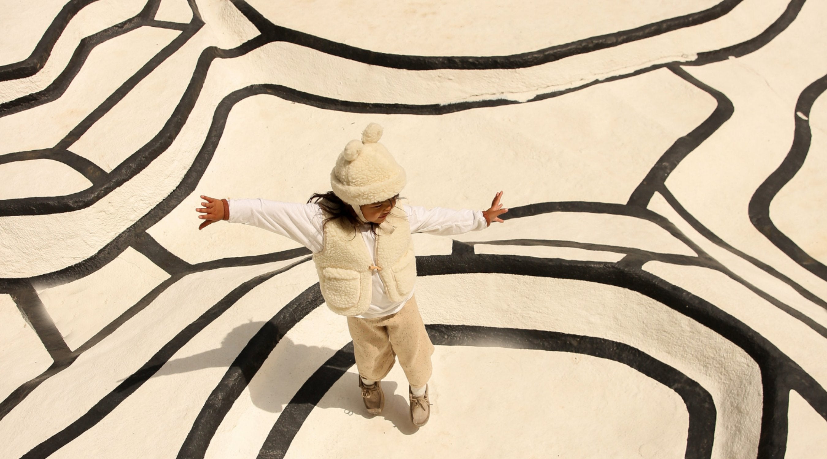 BINIBAMBA Pure Merino Gilet for Babies in our bestselling Milk Hue