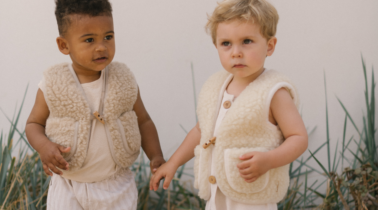 BINIBAMBA Pure Merino Gilet for Babies in our bestselling Milk Hue