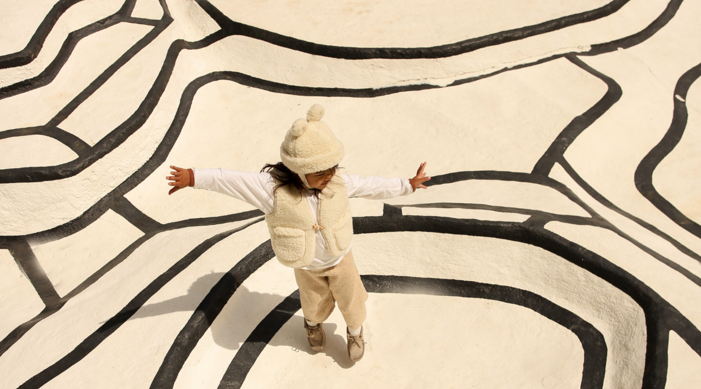 BINIBAMBA Pure Merino Gilet for Babies in our bestselling Milk Hue