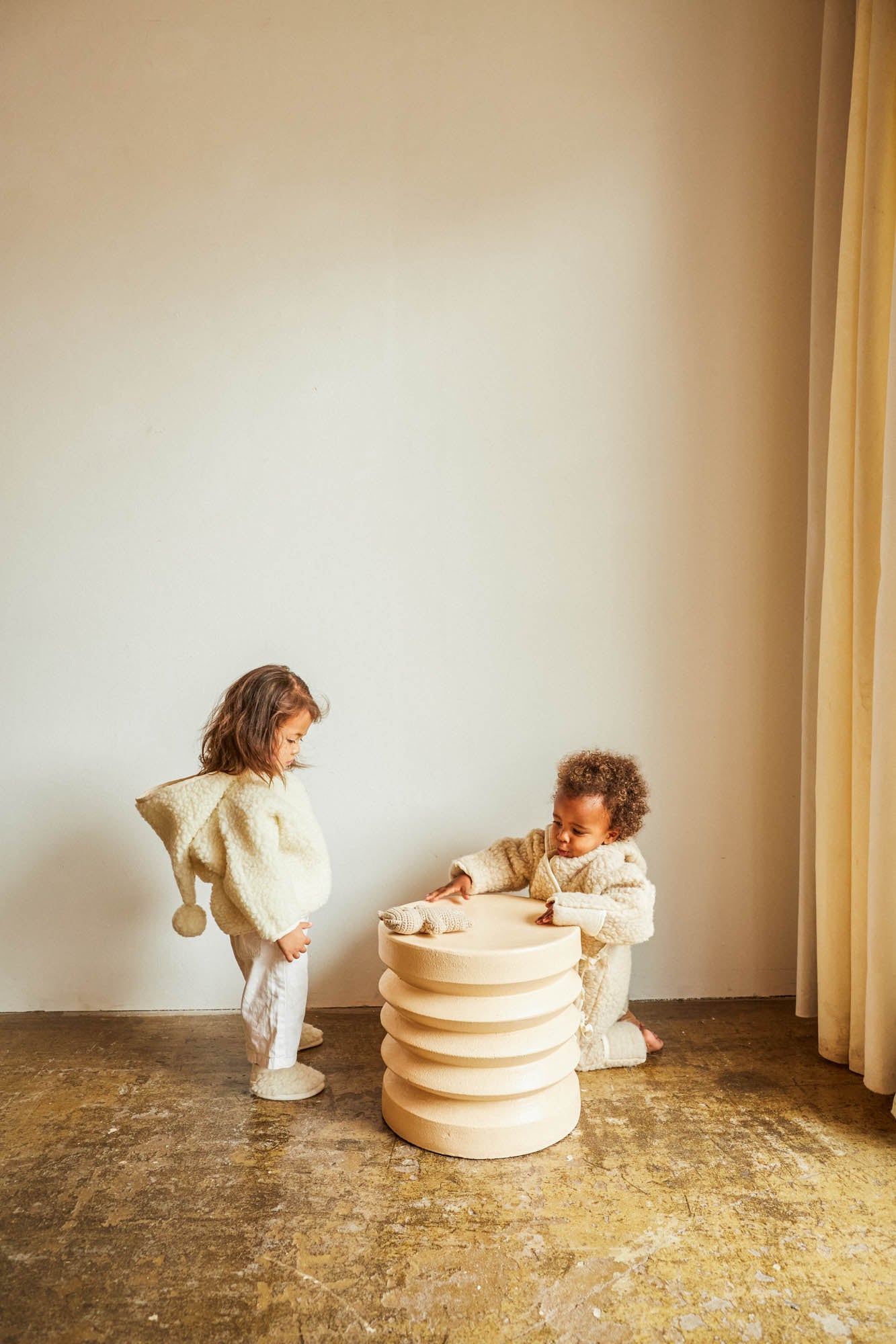BINIBAMBA Milk Snuggle Jacket & little boy wearing Peanut Snugglesuit