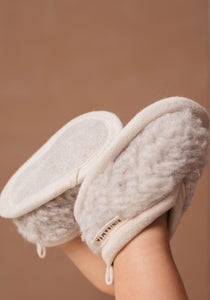 Sheepskin baby slippers made from merino wool with leather soles and suitable for babies