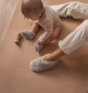 merino sheepskin baby booties in cloud grey with leather soles and available from newborn to two years