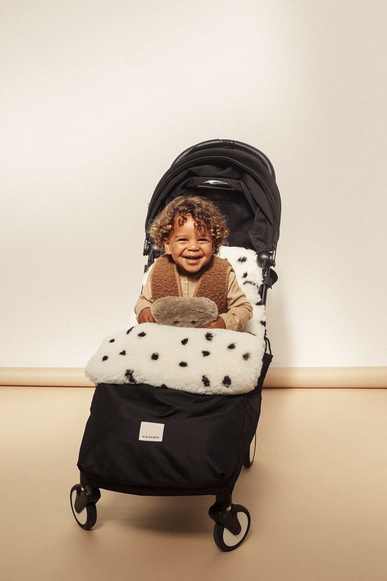 Dalmatian print puffmuff by  BINIBAMBA for babies buggy