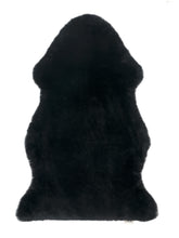 Load image into Gallery viewer, Binibamba black sheepskin wriggle mat rug for babies to use as a natural playmat