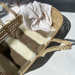 LIBERTY X BINIBAMBA STRIPE SHEEPSKIN BUGGY LINER IN A MOSES BASKET FOR BABY